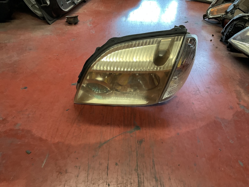 Faro izquierdo Nissan X Trail